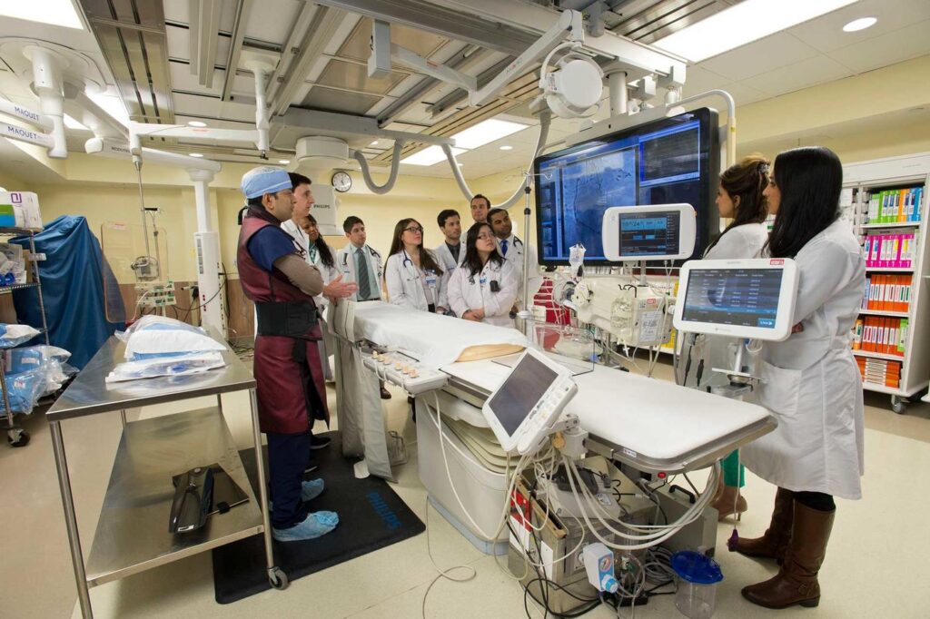 Doctor and students in a practical simulation room